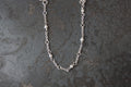 Einfaches Bettelarmband mit Perlen